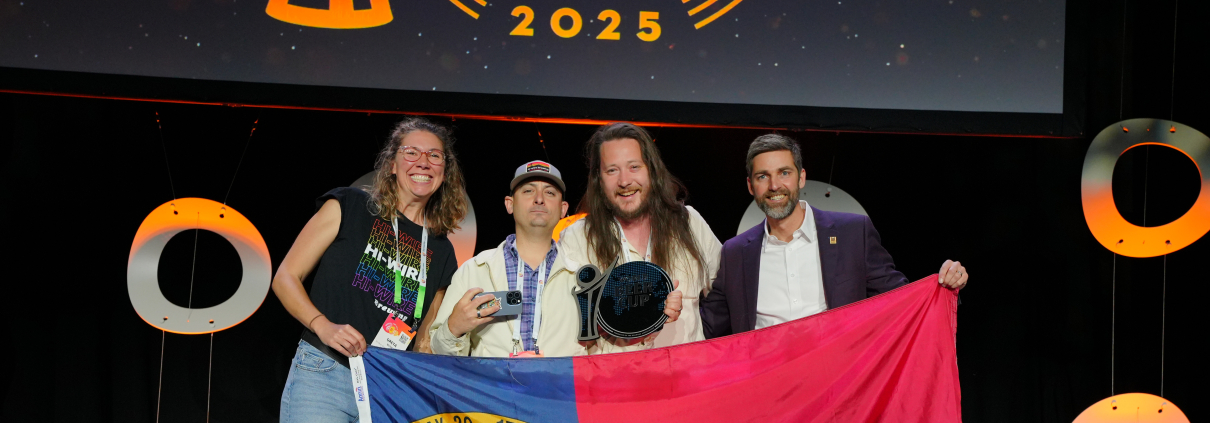 Hi-Wire staff members on the stage as they receive the silver award at the World Beer Cup